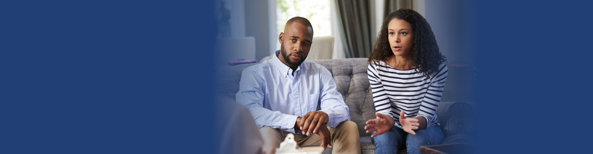a man woman listening to someone